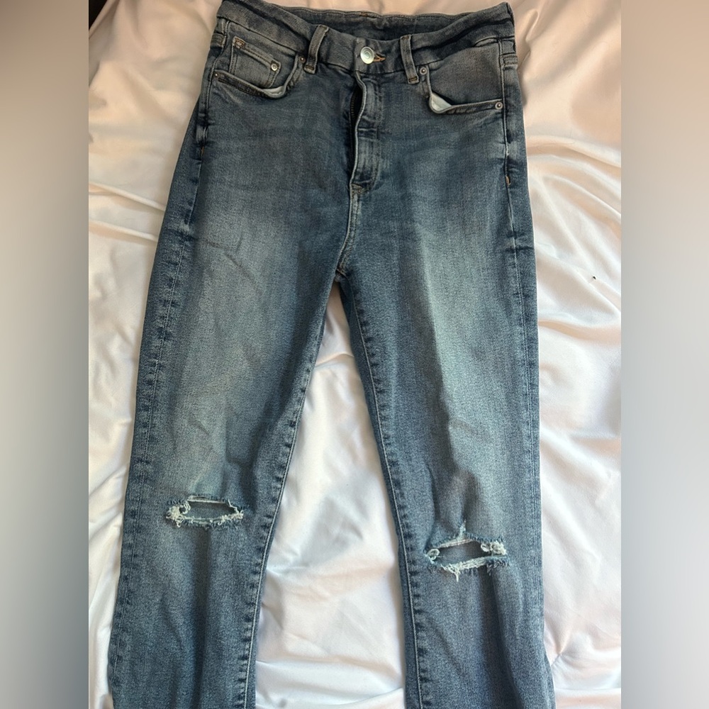 High Rise lightly distressed skinny jeans